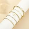 imageFansilver Gold Bracelets for Women Stackable Gold Beaded Bracelets Paperclip Tennis Bracelet 14K Real Gold Plated Stretch Bead Ball Bracelet with Letter PendantM
